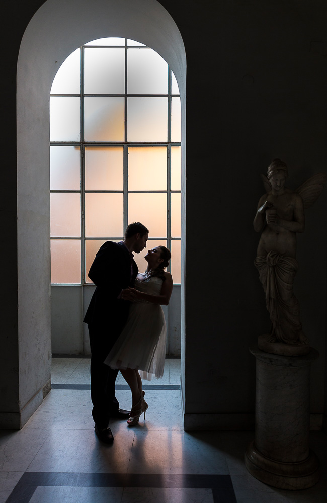 A romantic dip in a low light. Image taken in a residential building interior