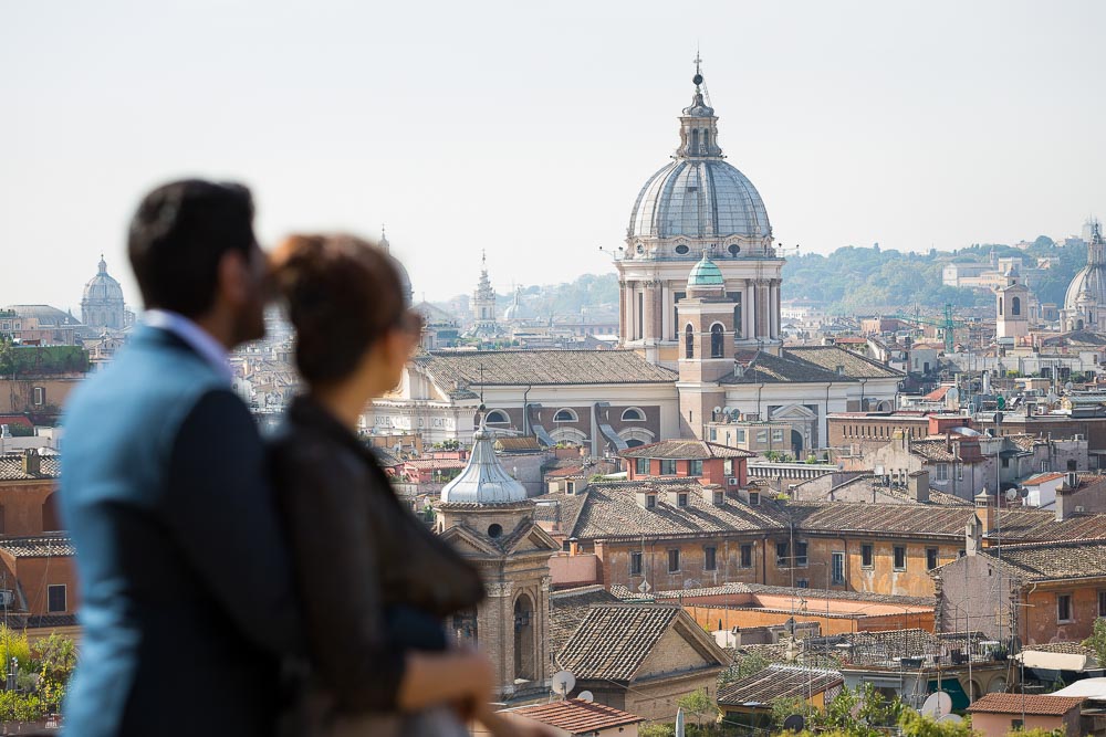 Couple view over the roman rooftops in Rome