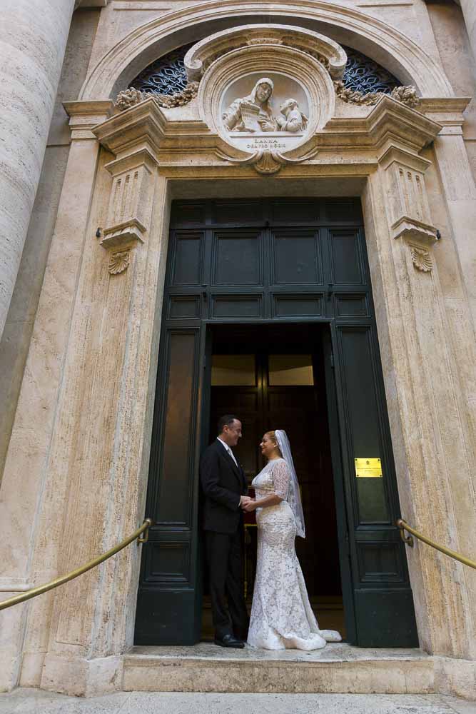 Church Santa Anna Blessing in the Vatican. Bride and Groom standing at the entrance.
