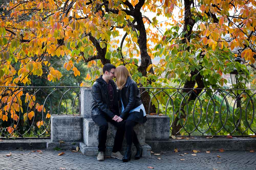 Portrait photography session among autumn leaves