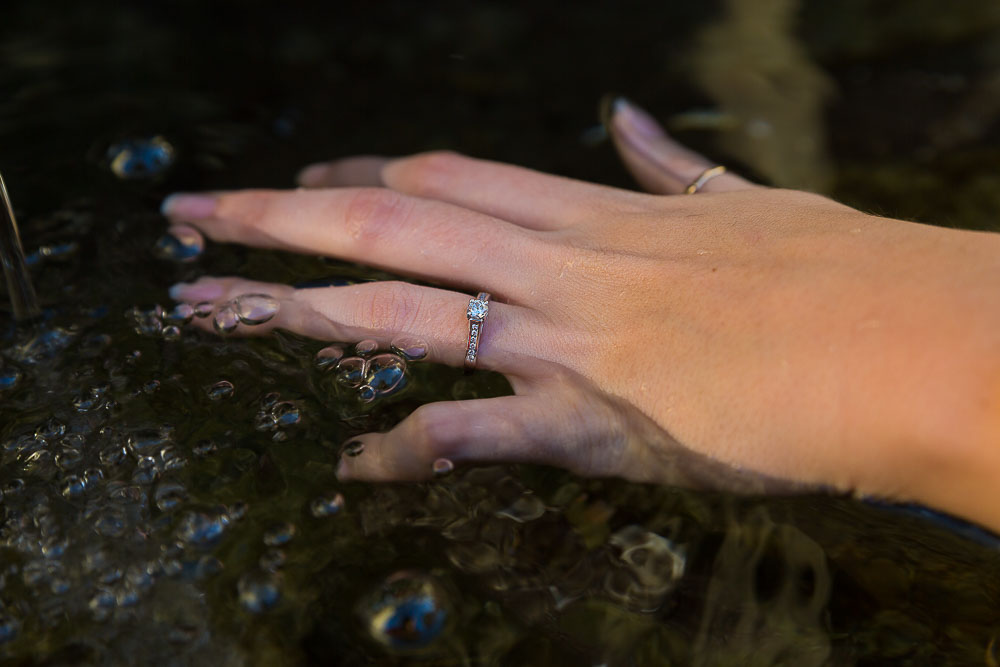 Picture of the engagement ring immersed in water.