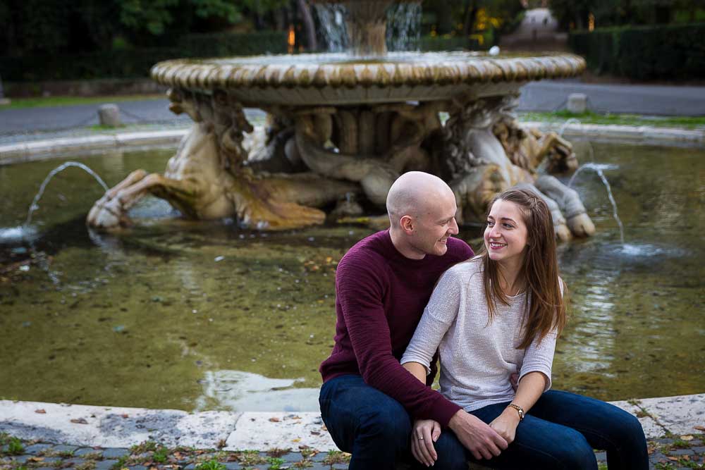 Engagement photo shoot by a water fountain