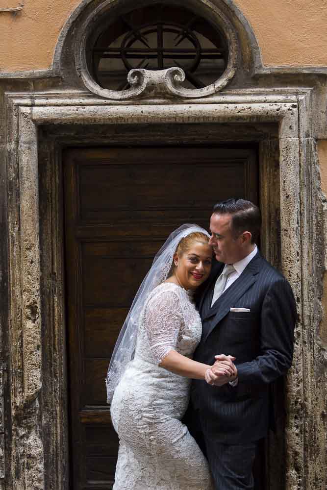 Portrait picture framed inside an ancient doorway.