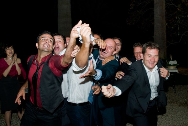 Tossing the garter end of wedding.