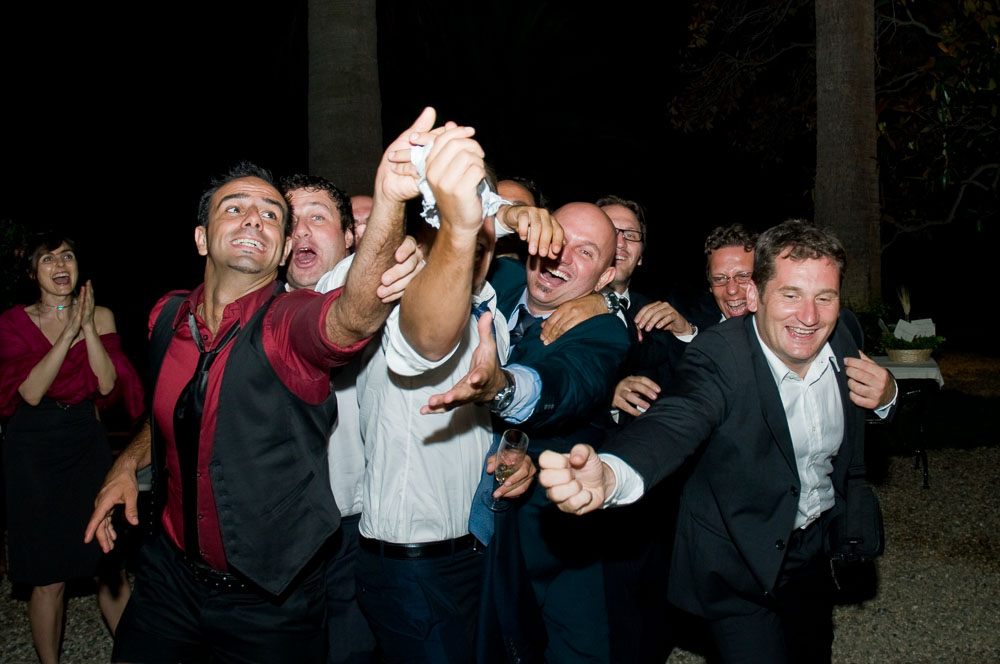 Tossing the garter end of wedding.