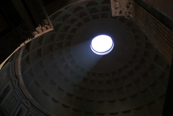 Light shining through the hole inside the Roman Pantheon.