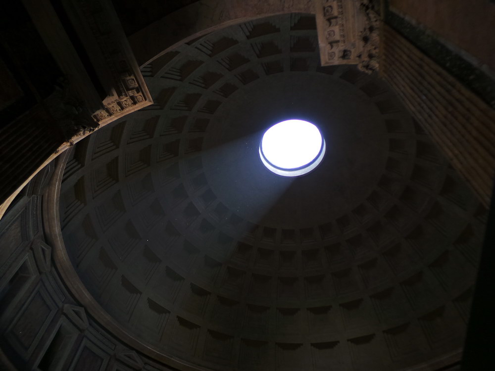 Light shining through the hole inside the Roman Pantheon.