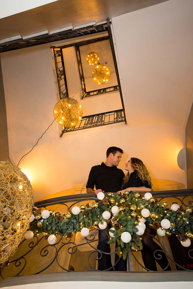 Hotel interior engagement session on the stairs of Hotel Anselmo