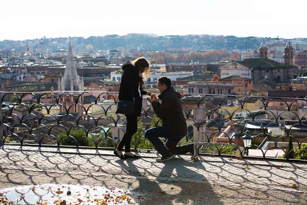 Marriage proposal ideas in Rome. One knee down. Overlooking the city.