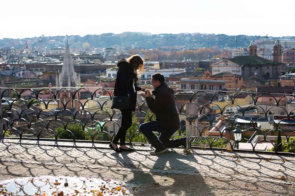 Marriage proposal ideas in Rome. One knee down. Overlooking the city.