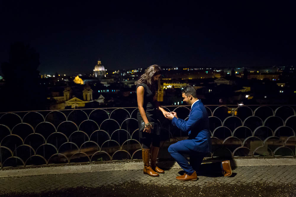 Surprise wedding proposal. Photographed at night at Parco del Pincio in Rome Italy.