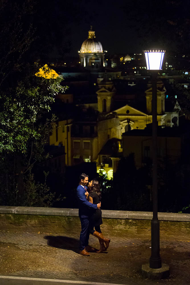Parco del Pincio view over the roman skyline in the evening. Nighttime engagement photos.