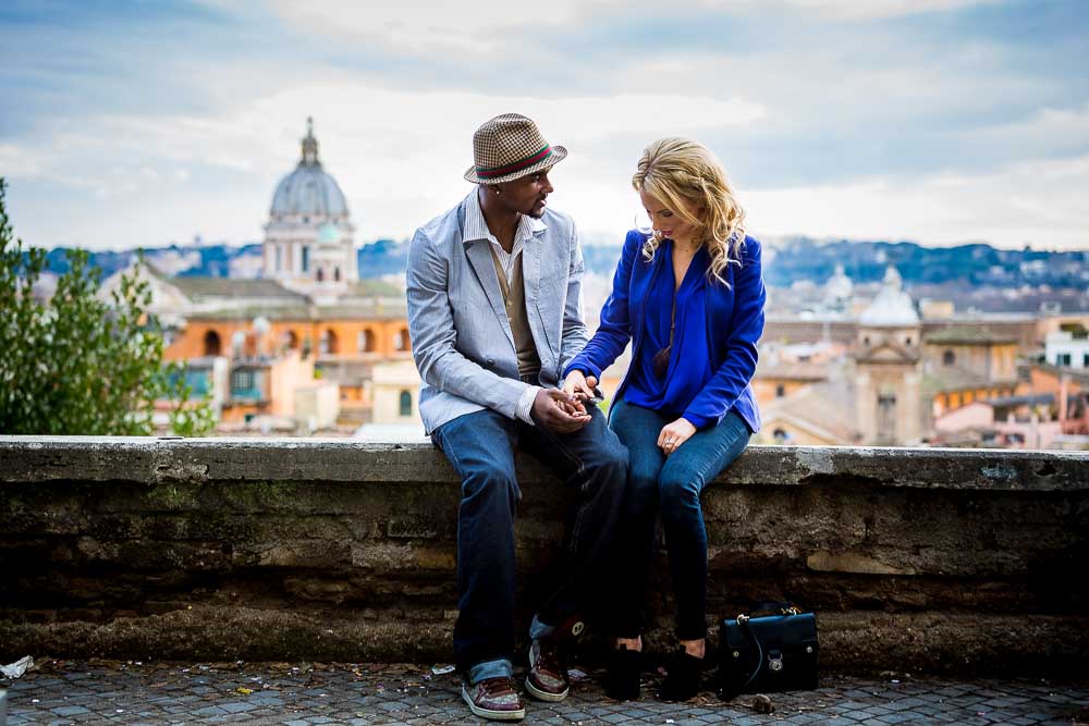 Sitting down with a stylish hat hanging out with your partner