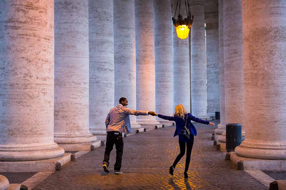 Dancing and walking under the Saint Peter's colonnade