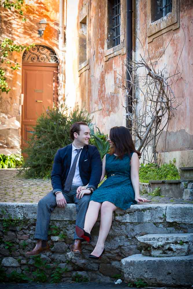 Sitting in an old roman street corner square