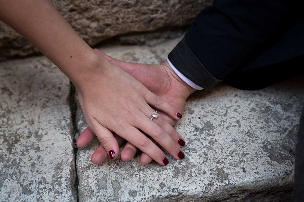 Engagement ring. Holding hands together.