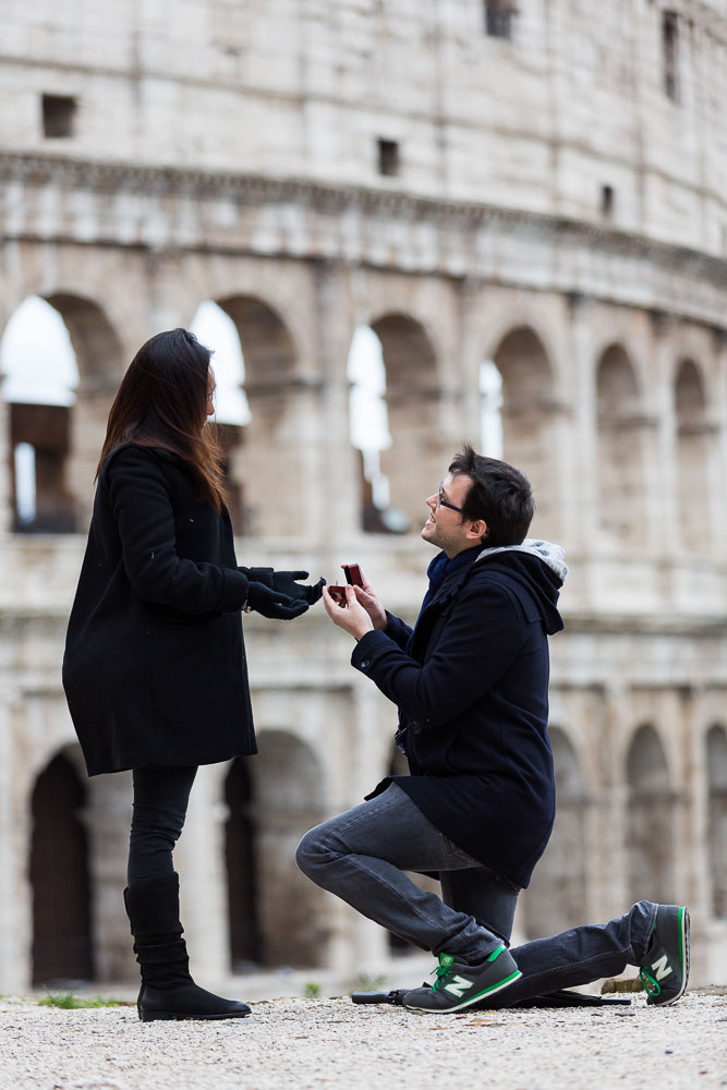 Surprise Wedding Proposal one knee down before the Roman Colosseum
