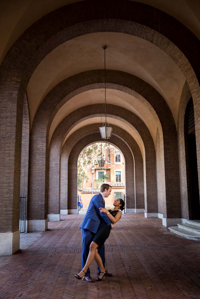 Engaged couple posing with a dip