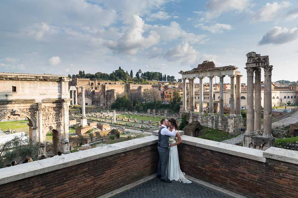Newly wed couple overlooking the ancient forum