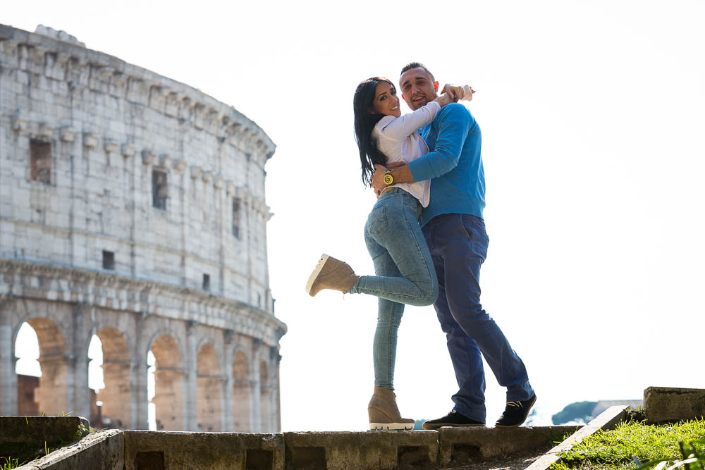 Couple posing during an e-session at the Coliseum