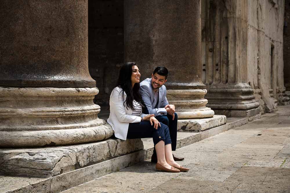 Sitting down and hanging out by the massive columns at the base of the Pantheon