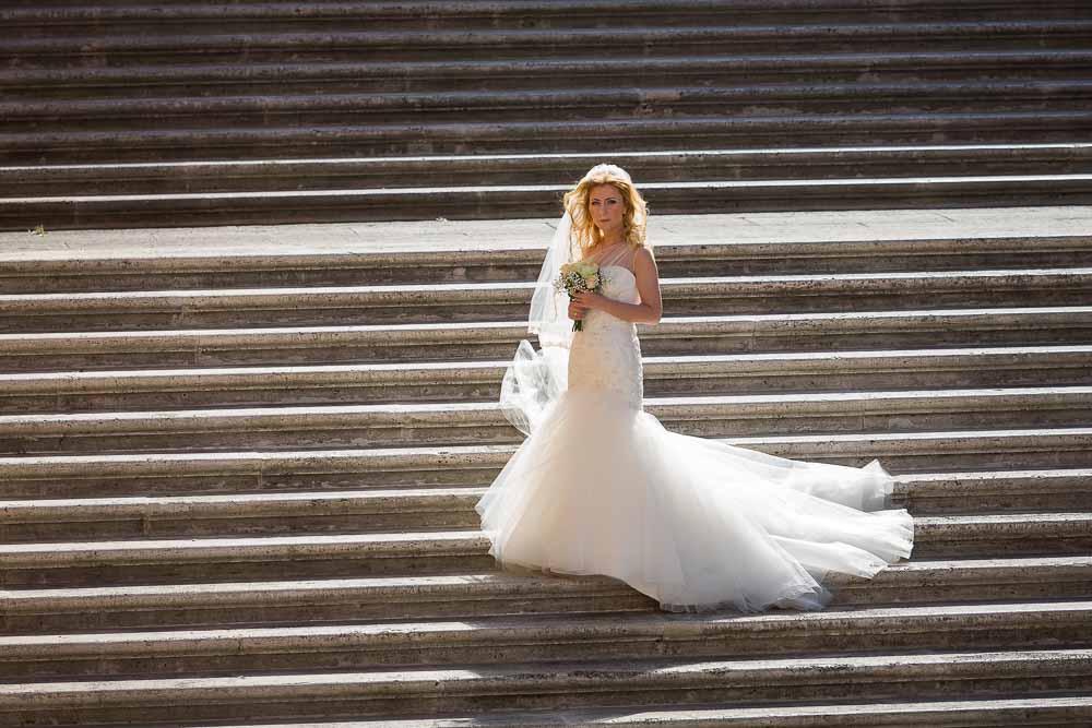 Bride solo portrait on steps