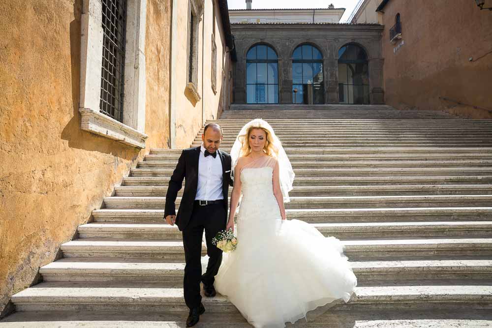 Walking down together after marriage in Rome