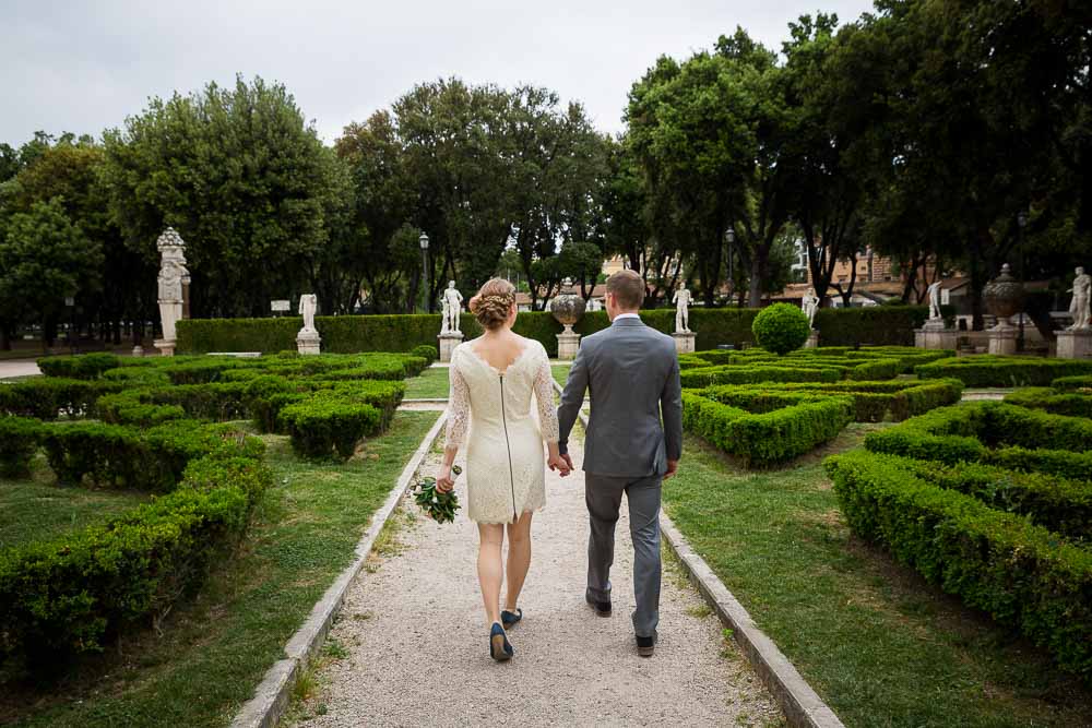 Just married. Bride and groom walking away.