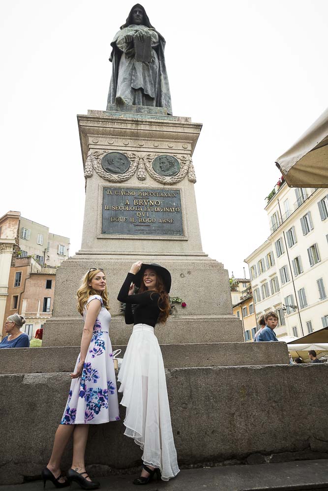 Posing underneath the statue of Giordano Bruno