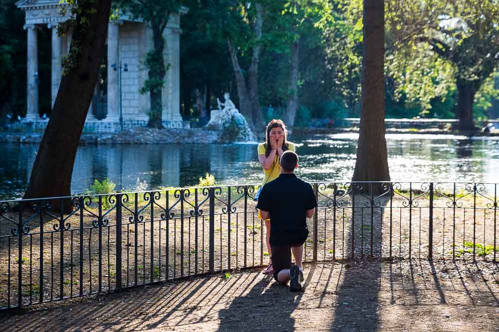 Rome marriage proposal in Italy by the side of the lake Villa Borghese