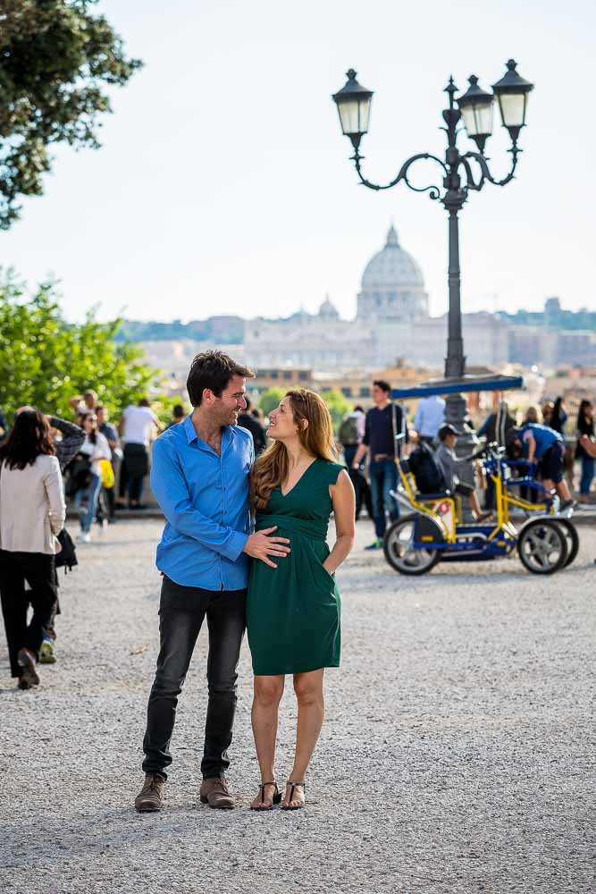 Prenatal outdoor photo session with the roman background of St. Peter's dome