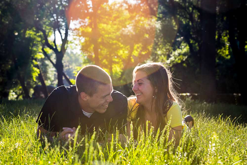 Relaxing. Laid back photo session in a park on green grass