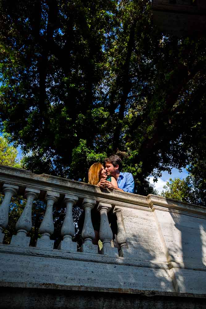 Kissing underneath a beautiful tree