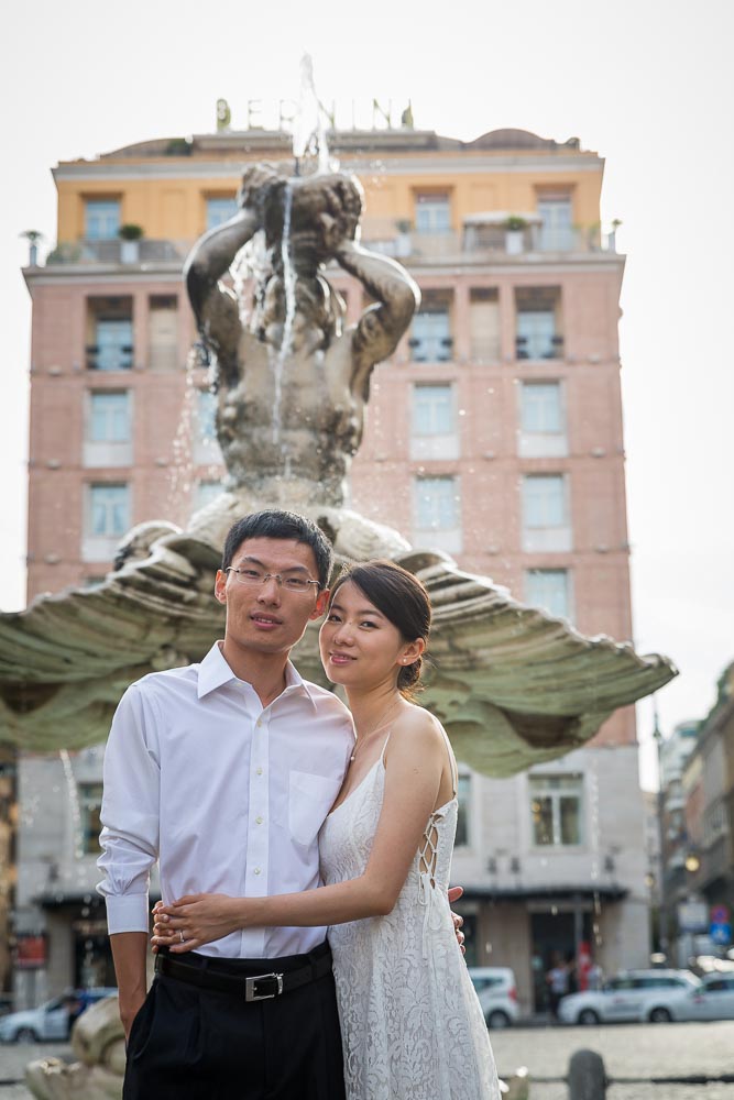 Post wedding photo shoot in Piazza Barberini by the water fountain