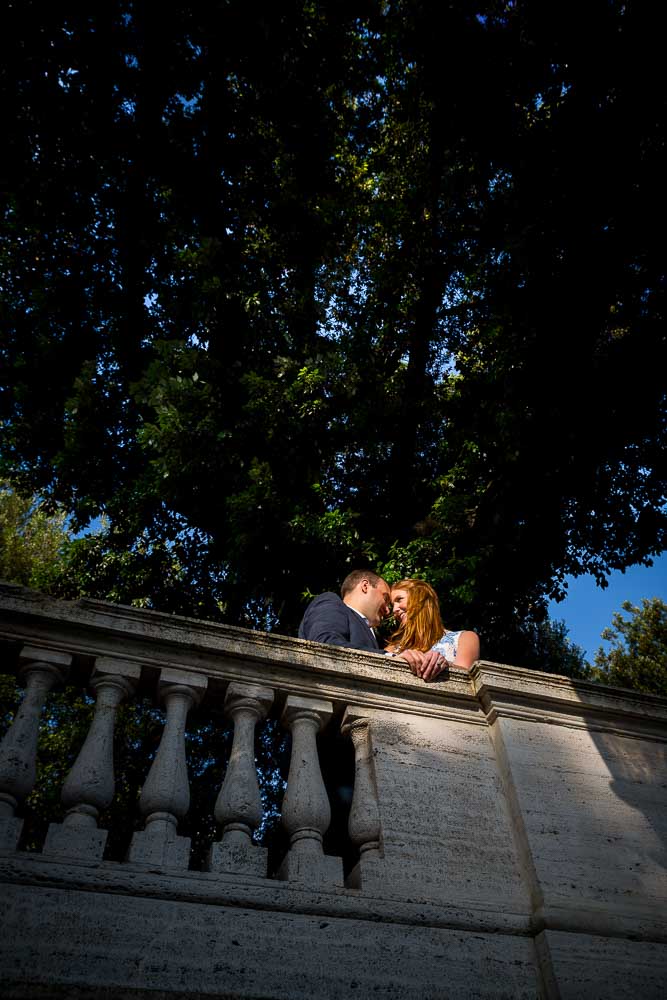 Kissing underneath a tree