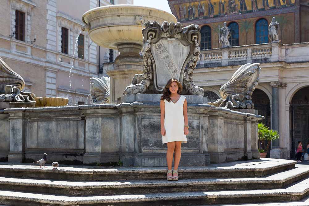 Young woman portrait picture in Piazza Santa Maria in Trastevere