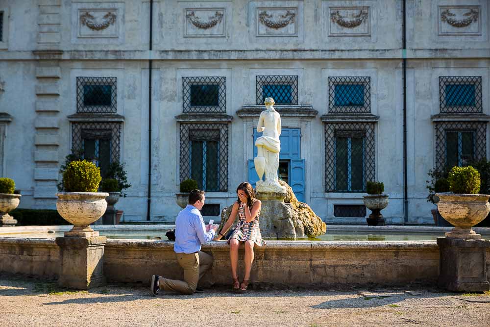 Man proposing marriage in Villa Borghese