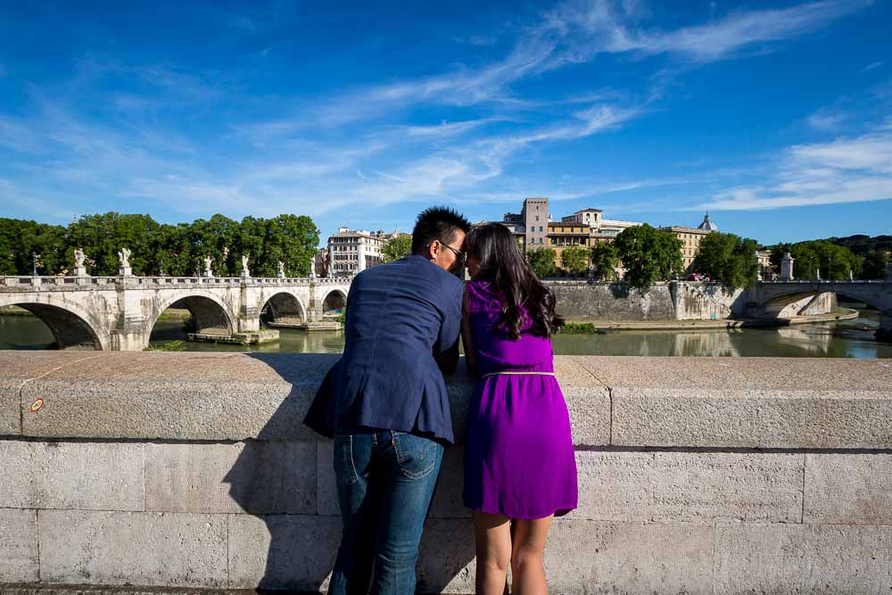 Overlooking together the Tiber river