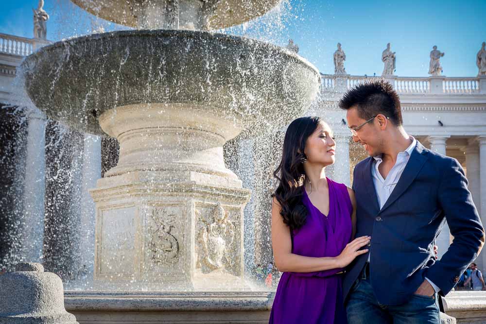 Posing by the water fountain in the Vaticano