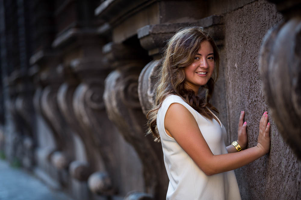 Posing next to the Farnese building