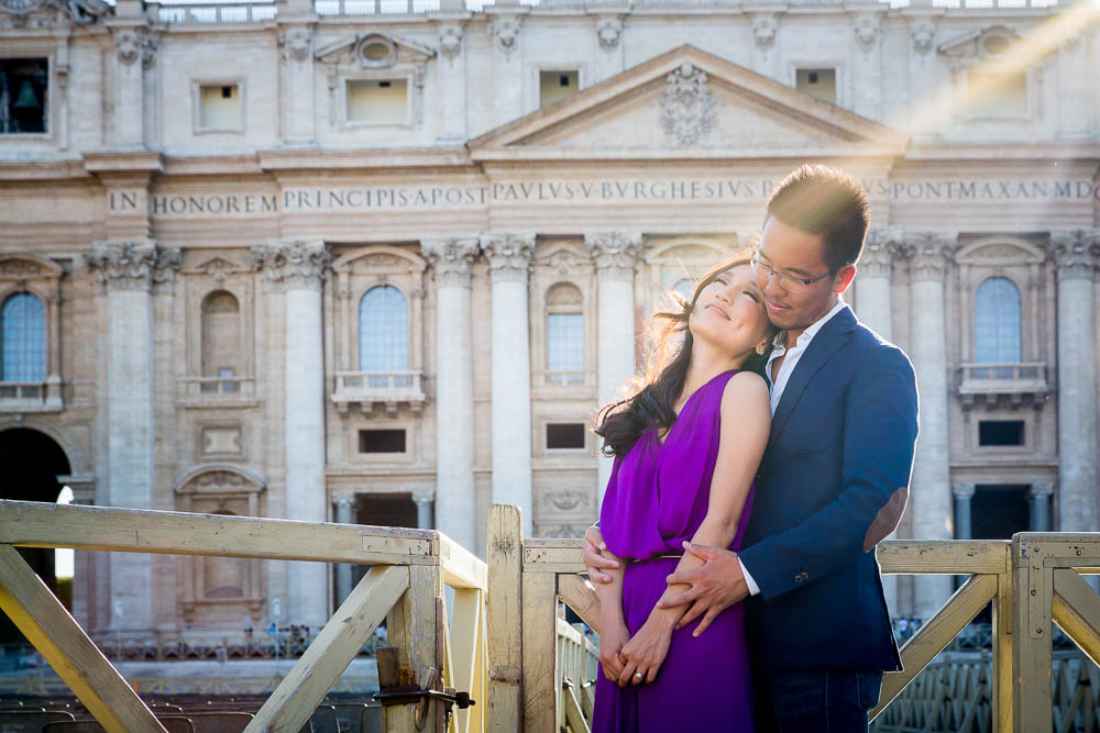 In love at the Vatican. Photo taken in front of the church facade