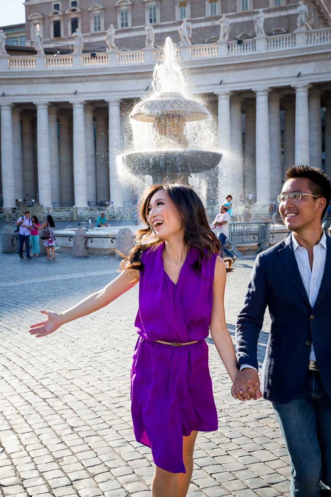 Having fun during an engagement session in the square