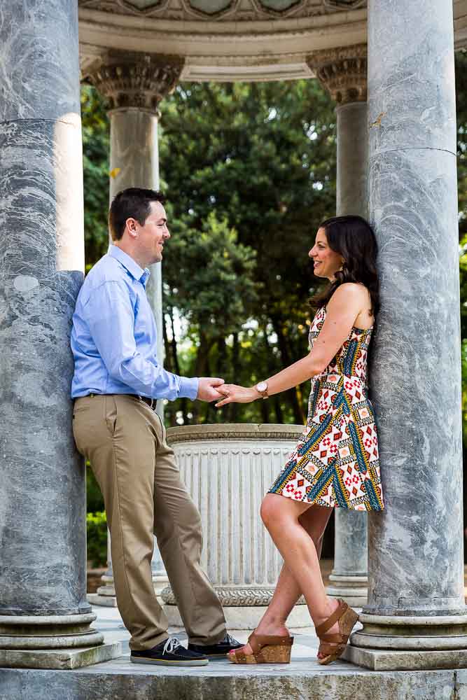 Posing couple in between columns at Temple of Diana