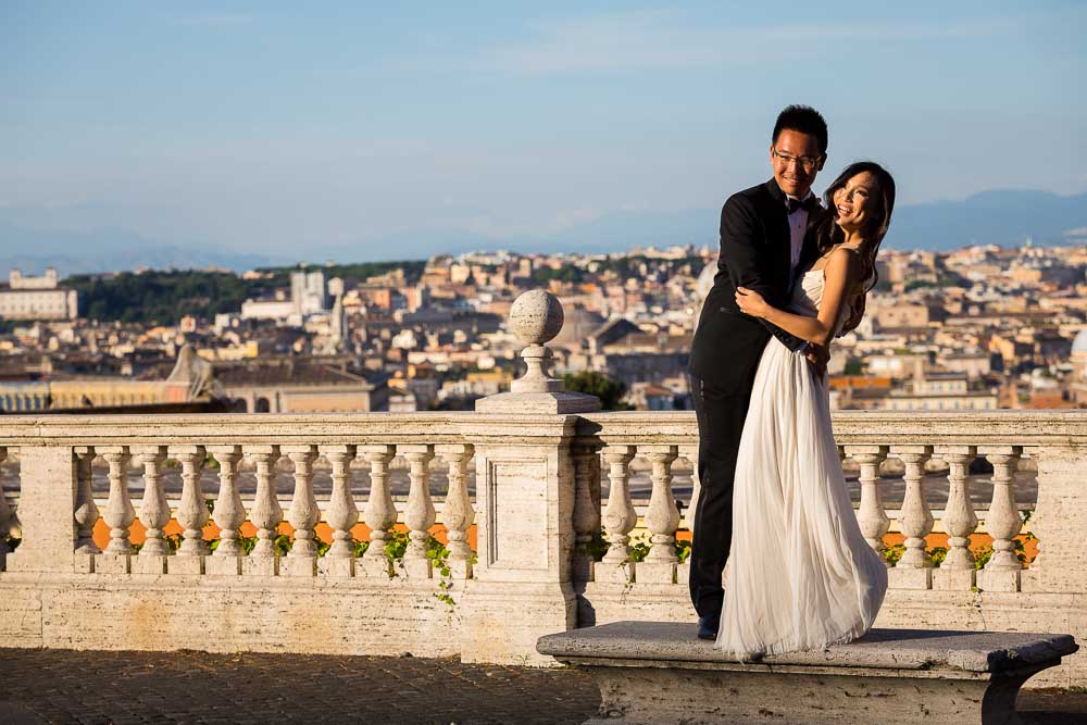 Sunset pictures of bride and groom overlooking the roman skyline