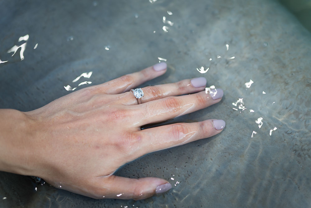 Had close up with engagement ring over fountain water