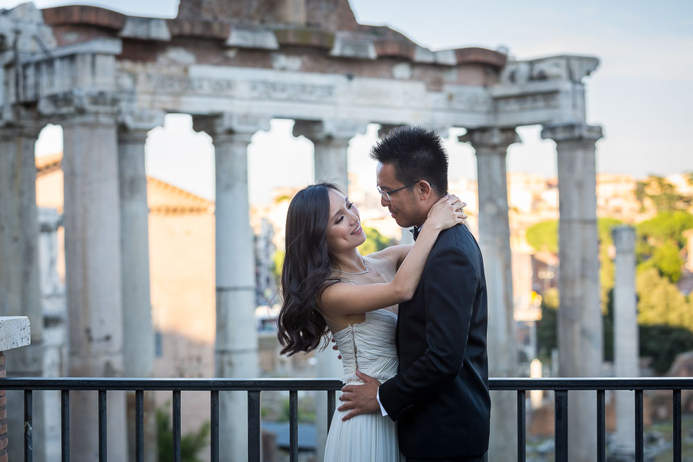 Posing at the Roman Forum during a pre-wedding photo shoot in Rome