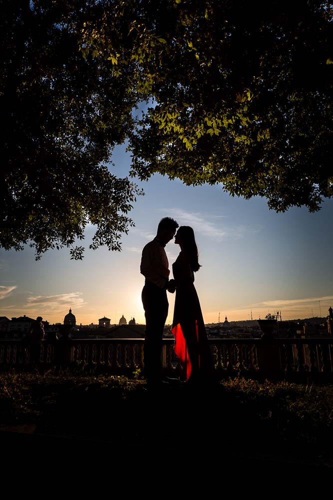 Artistic image of a couple posing during an engagement photo session in Rome Italy