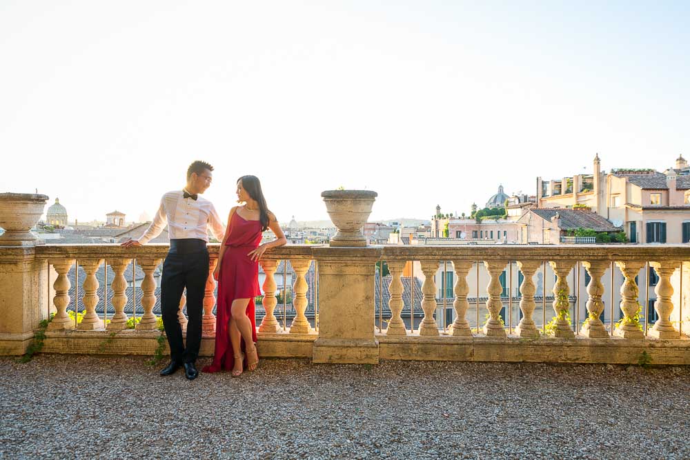 Relaxing together overlooking the roman rooftops in Rome