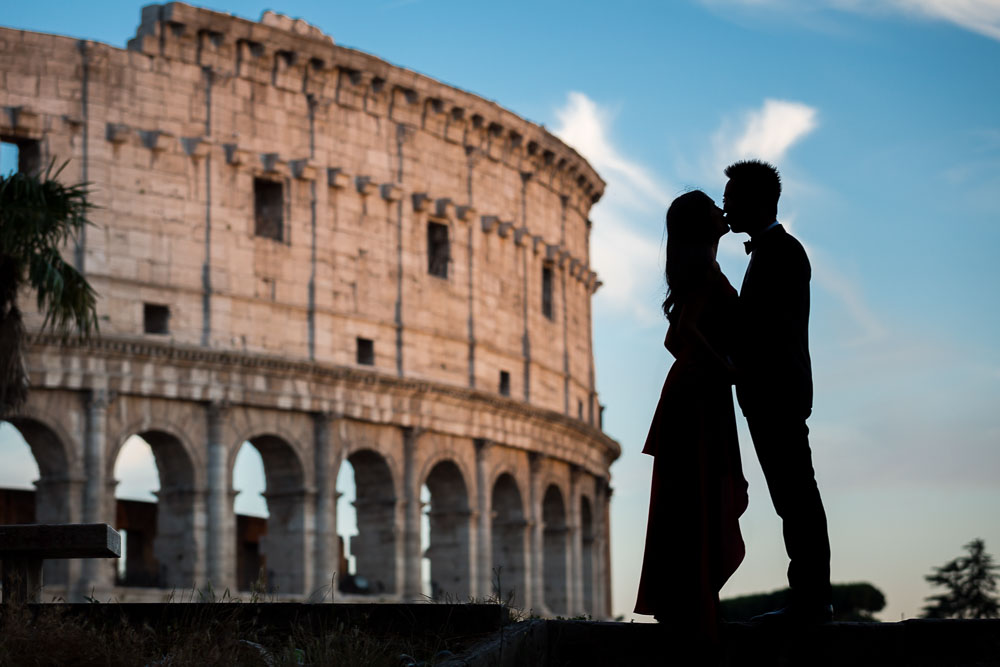 Roman Colosseum photo session. Silhouette photography. Rome, Italy