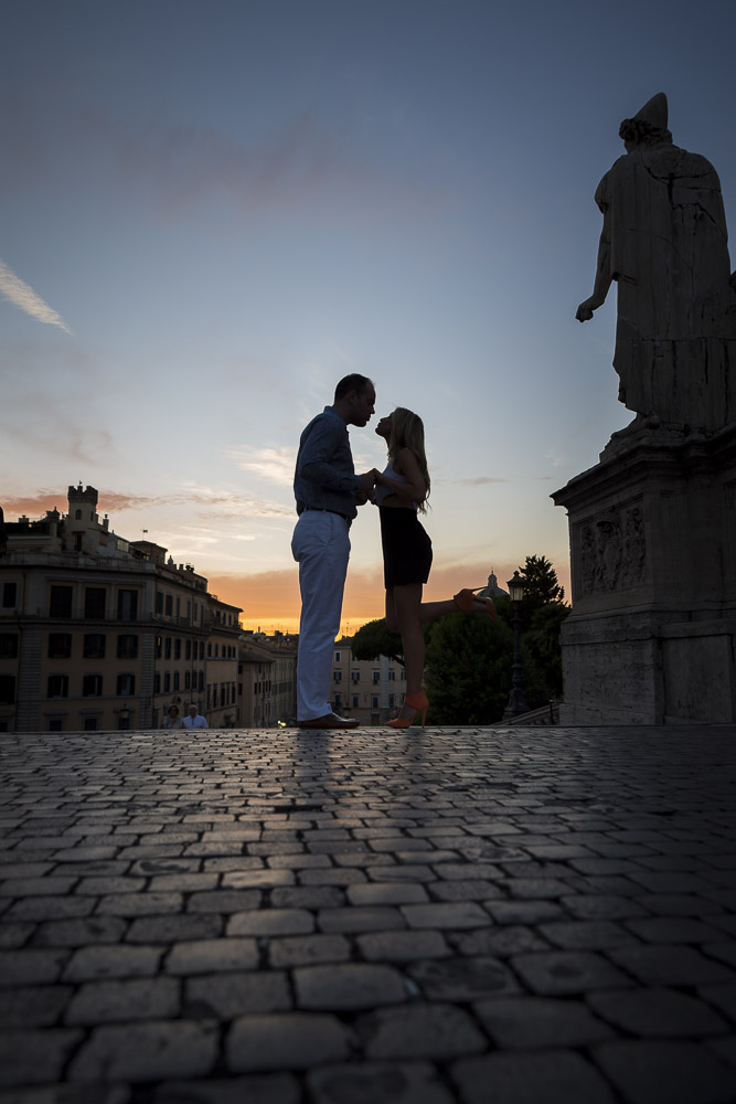 Silhouette image of a couple at sunset